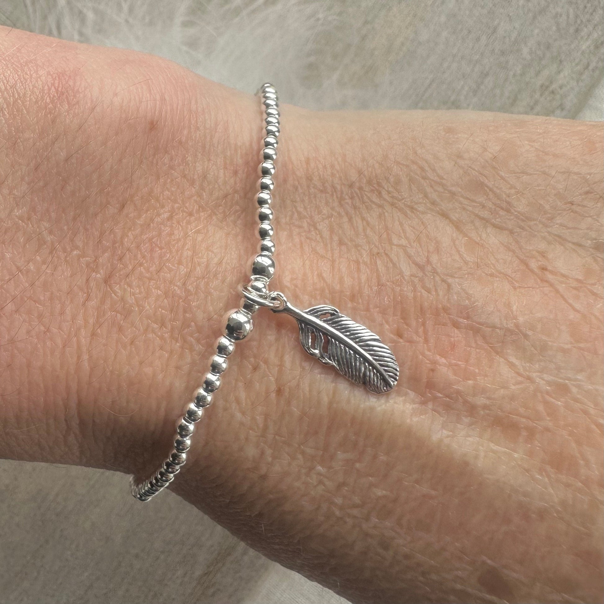 Stretch Feather Charm Bracelet, Dainty Layering Sterling Silver bracelet with feather