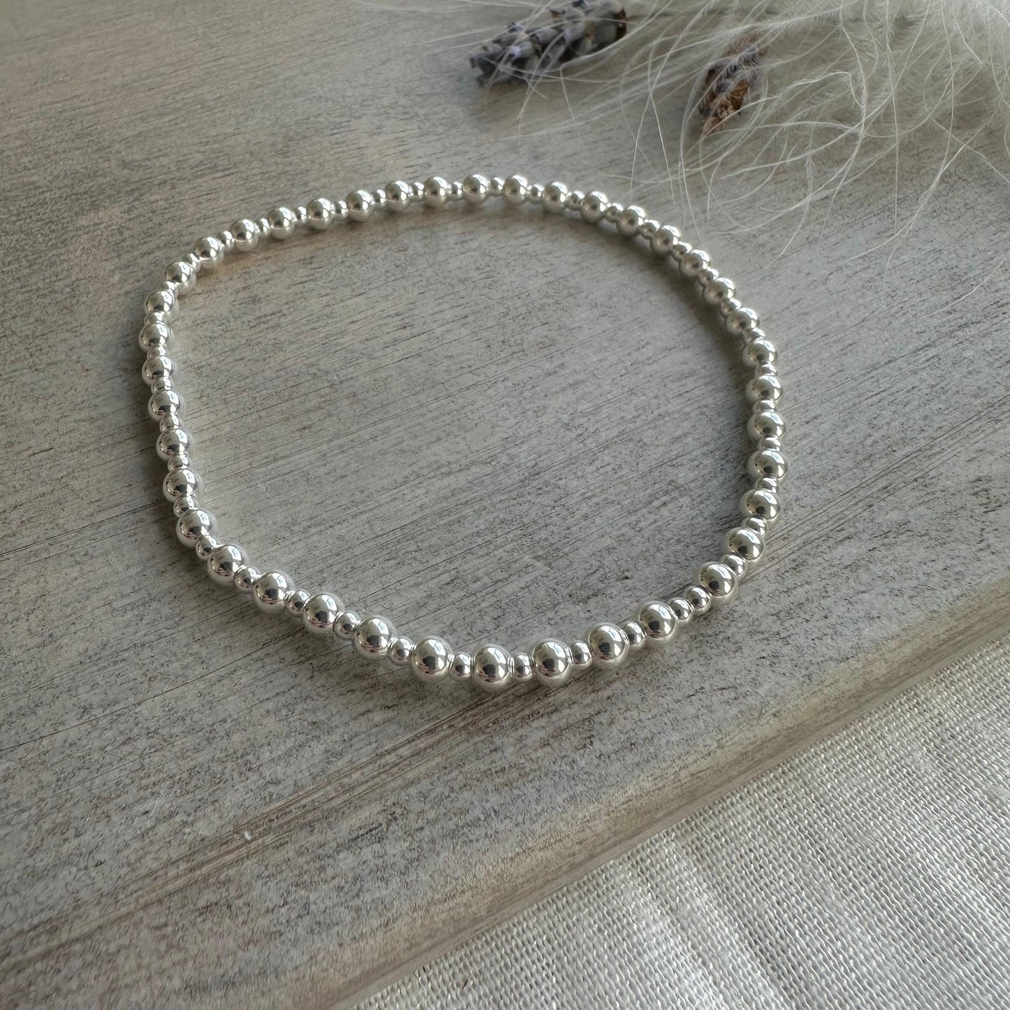 Stretchy 4mm Beaded Bracelet, Sterling Silver layering bracelet on stretch material