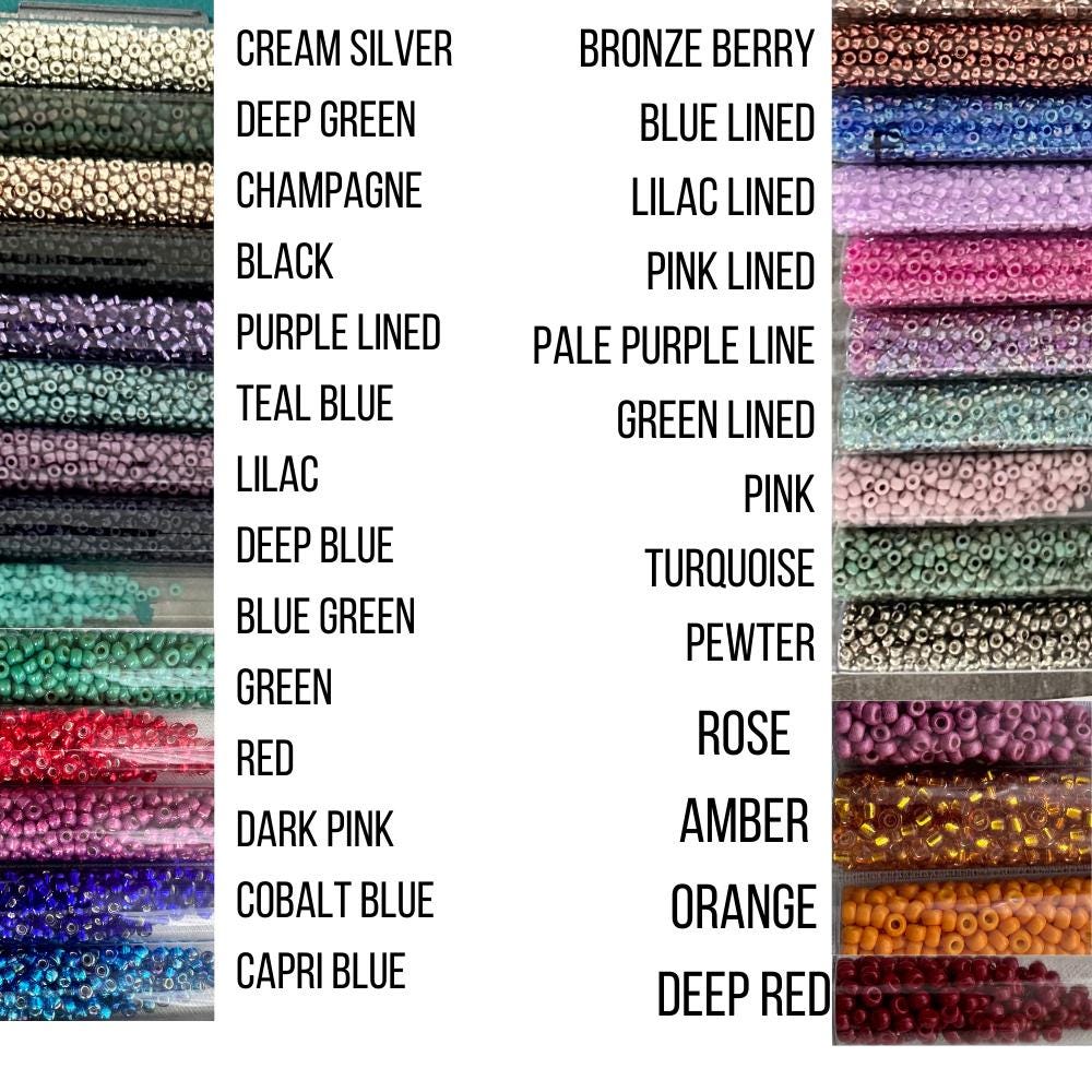 a bunch of different colors of beads