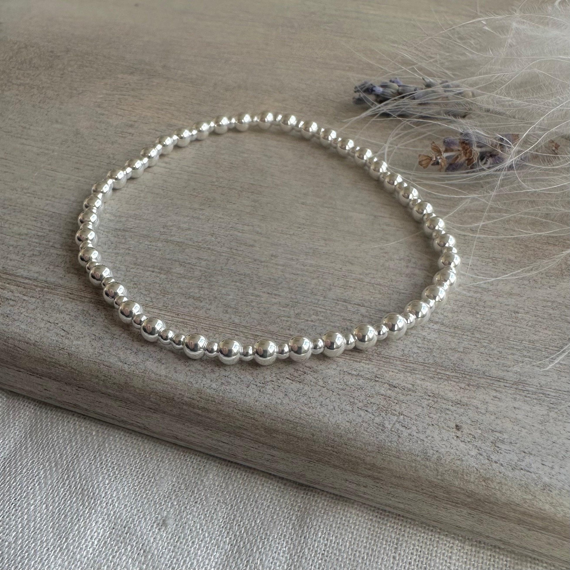 Stretchy 4mm Beaded Bracelet, Sterling Silver layering bracelet on stretch material